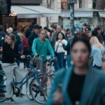 People are spontaneously photographed doing mundane tasks in the Eixample district of Barcelona. Their faces are blurred, and the author plays with the daylight to create movement. Learn how to describe the purpose of the image (opens in a new tab). Leave it blank if the image is purely decorative.