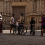 Group posing in front of Barcelona Cathedral, looking at the camera.