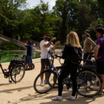 Group receiving explanations at Parc de la Ciutadella with bikes, Barcelona.