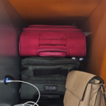 Locker with Two Luggage and Phone Charger